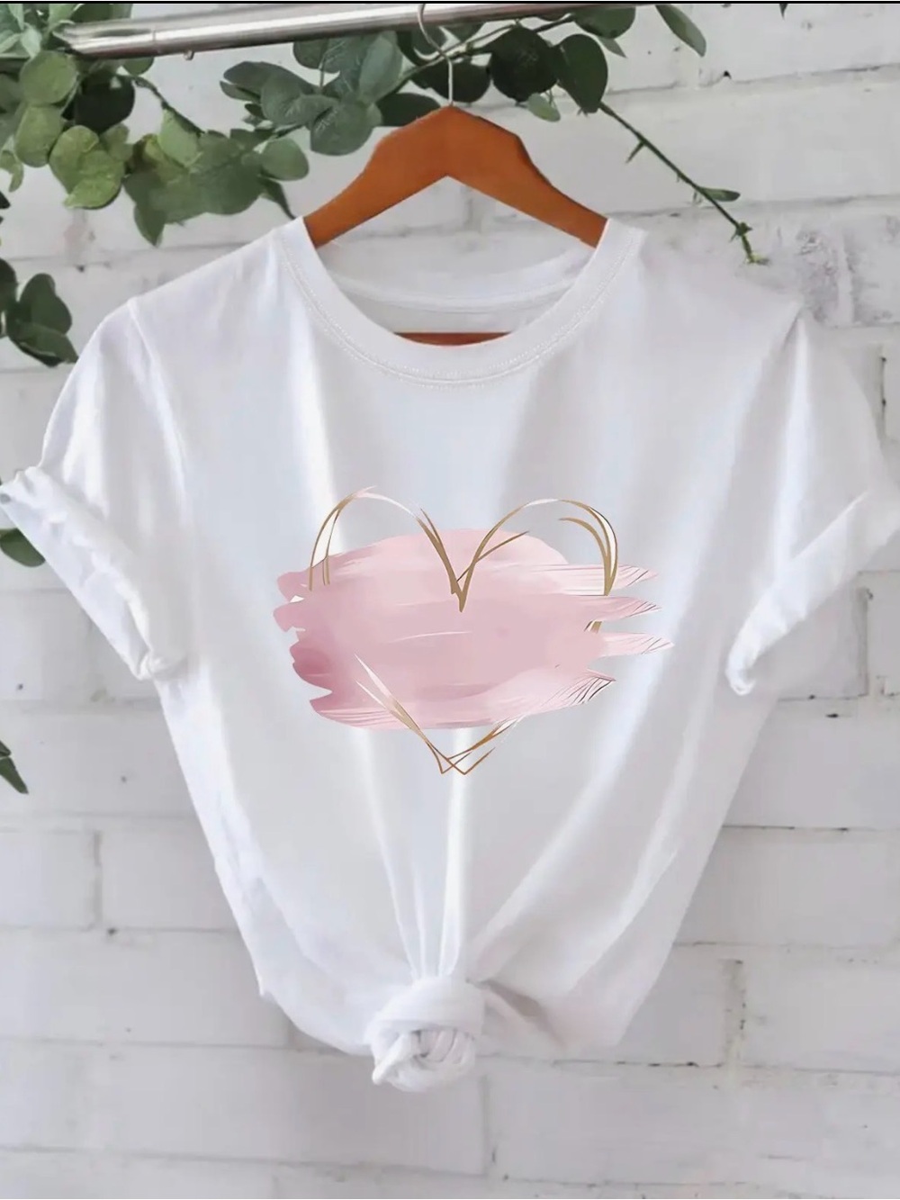 White Women's Graphic Tee with Pink Heart Brushstroke -